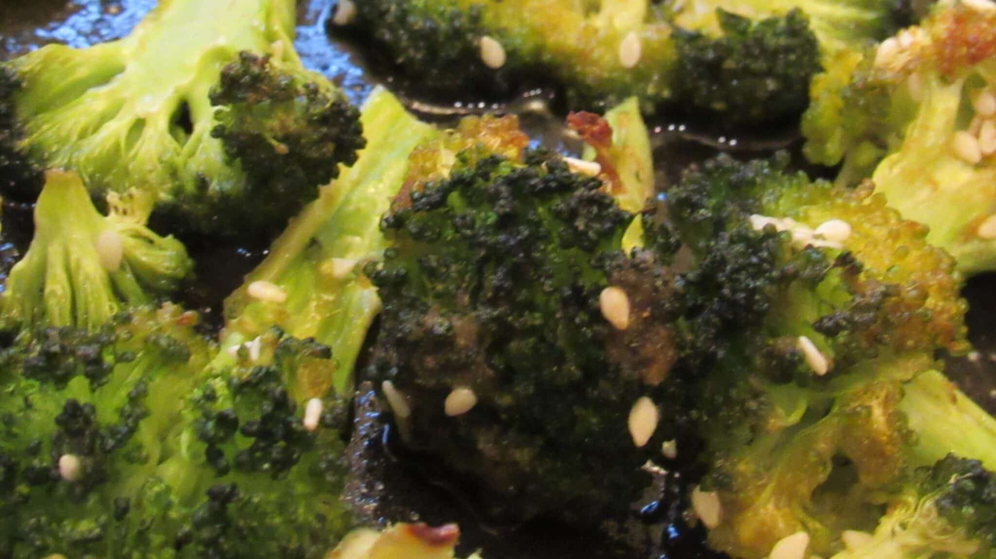 Roasted broccoli with cumin and honey. Close-up image.