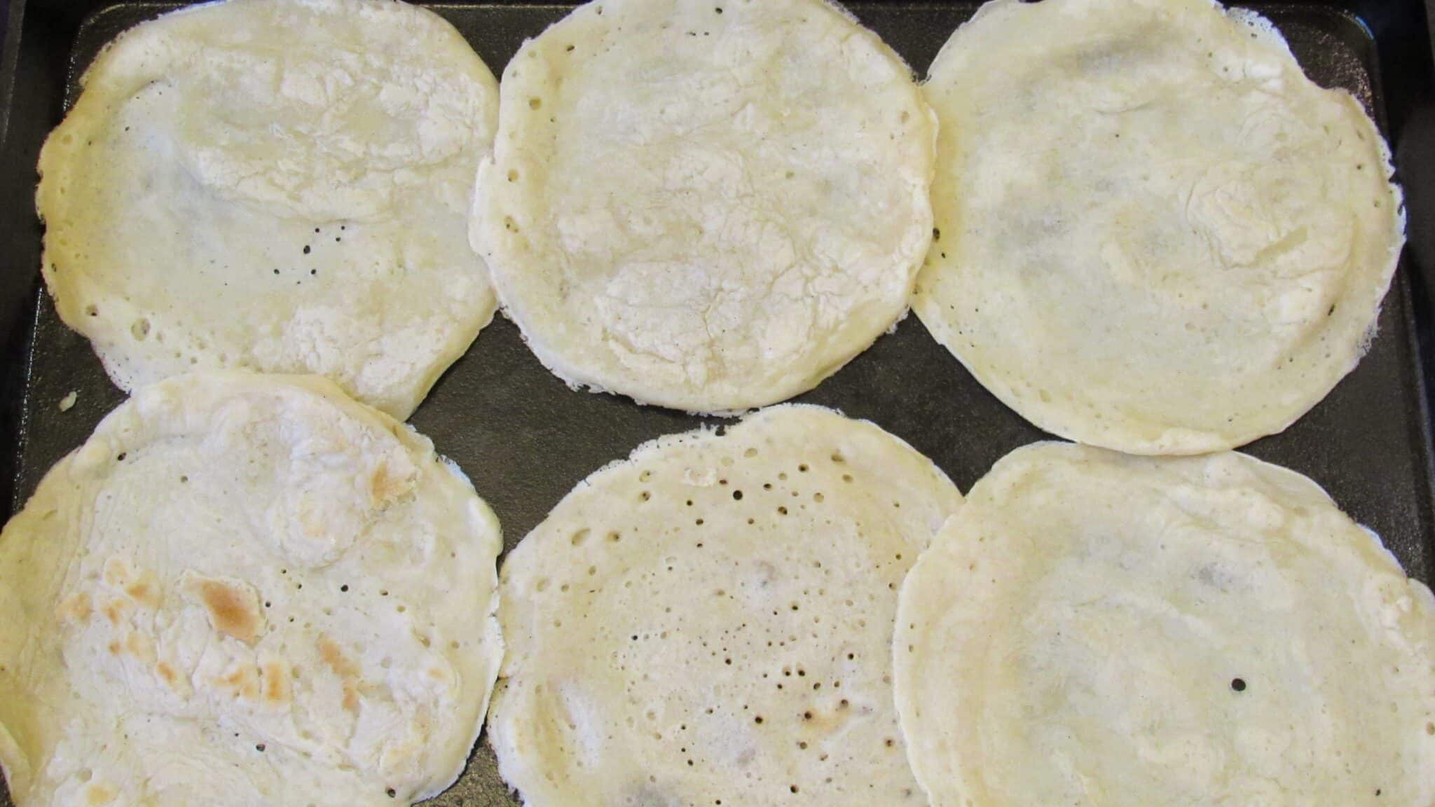 tortillas ready to be filled with cooked apples.