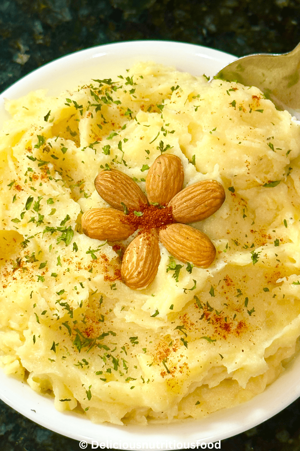 Almond milk mashed potatoes served on a white bowl.
