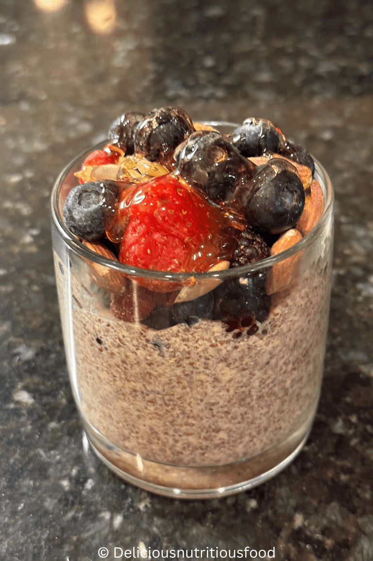 Flax seed pudding is served with frozen berries.