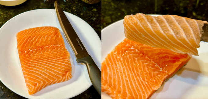 thinly slicing the fresh salmon.
